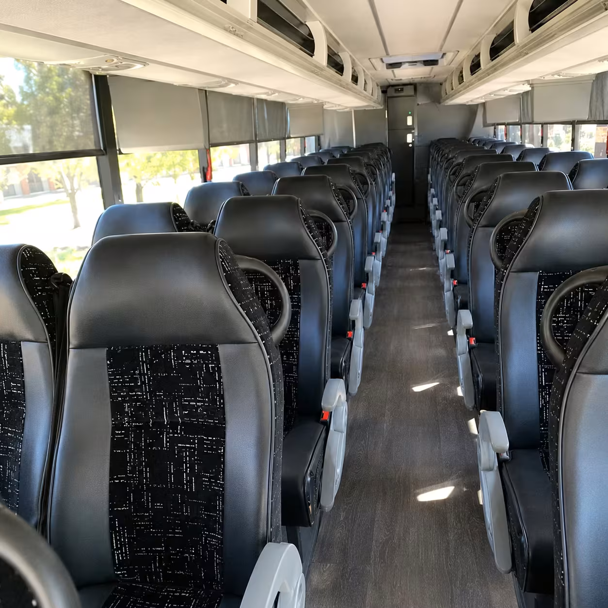 quincy 56 passenger charter bus rental